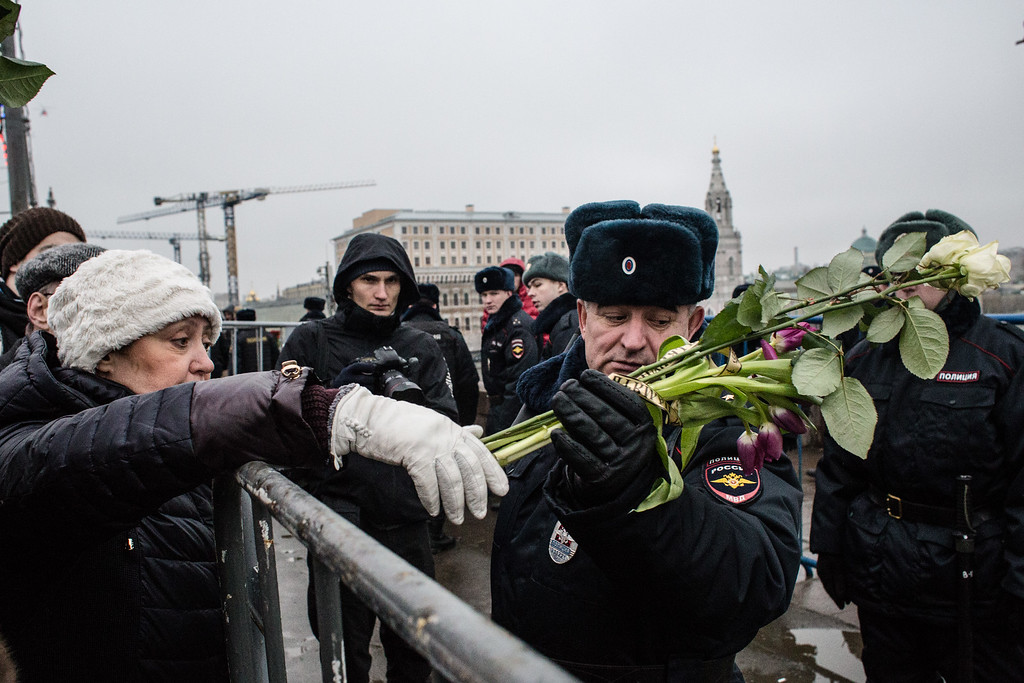 moscow, russia - march 01: people leave flowe